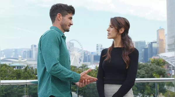 A couple in a strained interaction, suggesting emotional distance