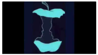 Optical illusion showcasing an apple core and two faces